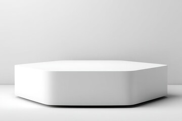Poster - Minimalist hexagonal display pedestal against a plain backdrop in a modern exhibition space