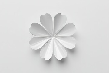Poster - Elegant white flower design made from paper with smooth, curved petals on a light background showcasing minimalist art