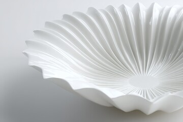 Poster - Stylish white serving bowl with intricate ribbed design placed on a minimalistic white background