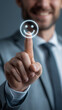 © Yeager arts - A smiling businessman confidently selects a digital smiley face, symbolizing positive feedback and customer satisfaction with a soft-focus background.