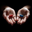 © X Land  - Hands holding red and blue pills on white background