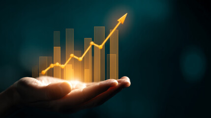 Poster - Hand holding glowing upward bar graph, symbolizing growth, success, and financial prosperity, ideal for business and investment concepts