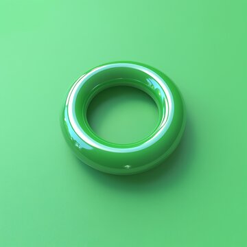 Bright green, glossy ring against a vibrant green background.