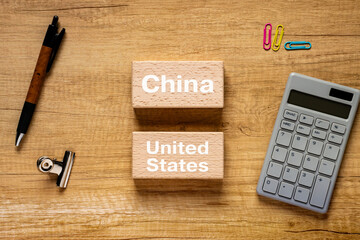 Poster - There is wood block with the word China or United States. It is as an eye-catching image.