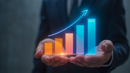 Poster - Businessman Holding Bar Graph with Projected Growth Trend for 2026 in Modern Office Setting