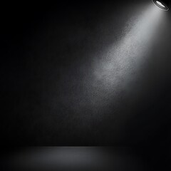 Poster - Dark room illuminated by a single spotlight, casting a dramatic light beam across a textured dark wall and floor. The contrast between light and shadow creates a moody and mysterious atmosphere