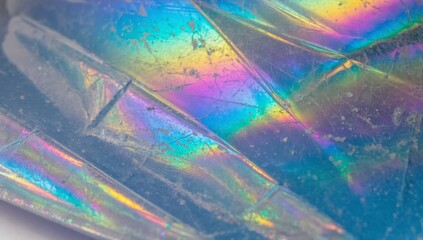 Poster - colorful abstract background with iridescent patterns and shimmering textures created by light refle