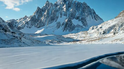 Wall Mural - lake surrounded by snowy mountains