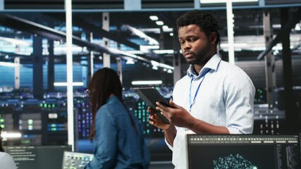 Poster - data center technician using tablet to do node tree programming, optimizing resource allocation. ser