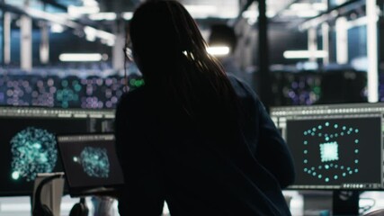 Poster - Data center programmer entering office uses node tree program to identify equipment performance issues. Server hub worker sitting at desk, reviewing data analysis graph to minimize failures, camera B