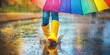 © Musa - A child is enjoying a rainy day splashing in a puddle
