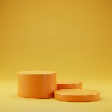 Displaying Orange Cylinders on a Yellow Stage Product Showcase Mockup