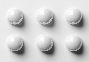 Poster - Minimalist White Spheres Displayed on a Smooth Light Surface for Elegant Design Concepts and Creative Background Artistic Uses