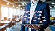 © Mia - Logistic and transport concept. Businessman showing virtual supply chain icon, Logistic management, organizing and controlling resources to meet the needs of customers.