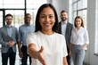 © Iuliia - Portrait of smiling african american businesswoman with straight hair extending hand in bright office, friendly hr manager or team leader greeting new employee