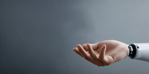 Poster - Technological Symbiosis: A futuristic robotic hand intertwined with a human hand, highlighting the potential of technology to reshape connections and interactions in a modern world.