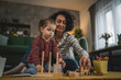 © Miljan Živković - Mother and daughter toddler child play at home