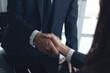 © tippapatt - Businessmen making handshake with partner at office, greeting, dealing, merger and acquisition, successful deal concept, for business, finance and investment, teamwork, partnership, hand shaking