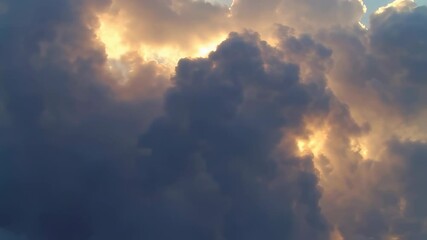 Wall Mural - A illuminating the sky with vibrant colors and soft clouds
