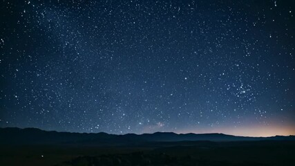 clear starry night sky over a quiet landscape, offering a breathtaking view of the cosmos.