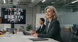 © SRD - Successful Businesswoman Leading a Virtual Team Meeting