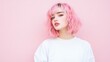 © mashimara - Pink Hair,  Stylish Girl: A young woman with stylish pink hair and bangs poses confidently against a pink backdrop.  Her bob haircut and soft makeup complete the trendy aesthetic.