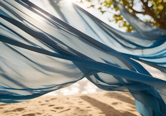Wall Mural - transparent wavy blue fabric on the shore