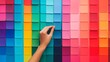© pkproject - Vibrant Color Palette with Hand Reaching Towards Swatches - Creative Design Trend