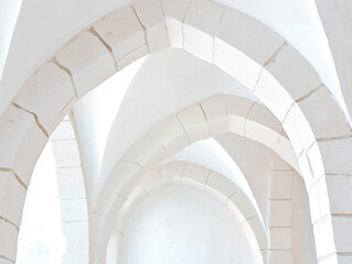 Poster - white stone arches in a minimalistic architectural interior with soft natural lighting and smooth ge