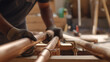 © Bhait - Craftsman Assembling Copper Pipes in Workshop