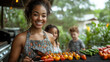 © webcesastock - Woman grilling vegetables with children in the background