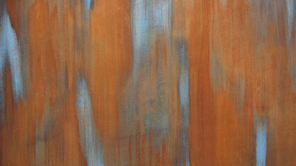 Fototapete - image is of a rustic, textured wall with a blue and orange color scheme. The wall appears to be made of wood and has a rough, uneven surface. The blue and orange colors create a warm