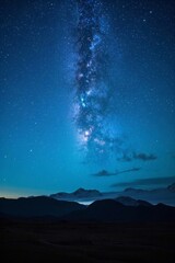 Wall Mural - milky over the mountains and a road at night