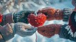© Sana - Woman hands in knitted mittens holding red heart on snowy background. Valentine's Day Concept