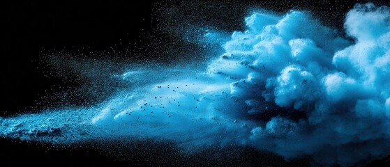 Poster - Ethereal blue powder explosion against a dark background creating a dynamic and captivating visual effect for modern art