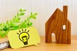 © 78art - 木の家とノートと豆電球の絵