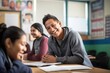 © Rawpixel.com - Tutor teaching teenage Hispanic student classroom smiling.
