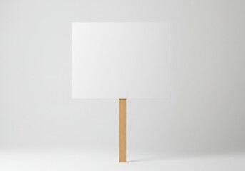 Poster - A blank white square sign held up by a wooden stick in a minimalist white studio background setting scene