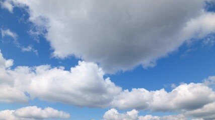 Wall Mural - beautiful blue sky with soft white clouds timelapse for abstract background