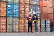 © eakgrungenerd - Container logistic shipping, Foreman worker and Industrial engineer women checking loading containers at terminal port transport goods. warehouse import - export industrial.