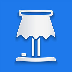 Poster - Paper cut Table lamp icon isolated on blue background. Paper art style. Vector