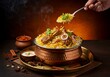 © Dekio - Exquisite lamb biryani served in traditional copper pot on a dark background