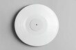 © Jannik - Minimalist mockup of a vinyl record with a blank white cover on a gray background