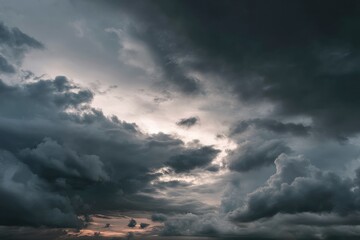 Wall Mural - dramatic overcast sky with gray clouds forming moody and tranquil backdrop before rain, capturing th