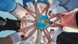 © Довидович Михаил - School friends holding a globe together, symbolizing environmental protection and global unity