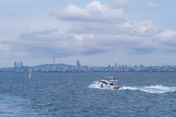 Poster - Enjoying a day on the water with yachts cruising against the skyline of Prince Islands and the city beyond