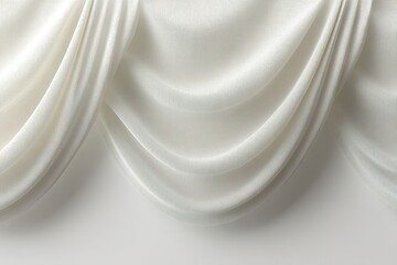 Poster - Elegant white fabric draping softly against a light background creating a serene and sophisticated aesthetic in interior design