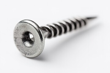 Poster - Screw with a flat head resting on a clean surface, demonstrating its threading and detailing for assembly tasks