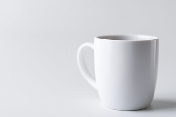 Aufkleber - minimalistic image of cup or mug isolated on white background showcasing clean lines and curves