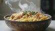 © artchvit - Chicken noodle soup comfort food Steaming bowl of pasta with meat and herbs in a rustic bowl.